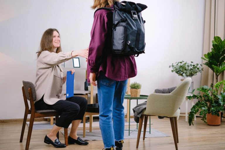 A woman greeting and trying to impress a client in the first meeting.