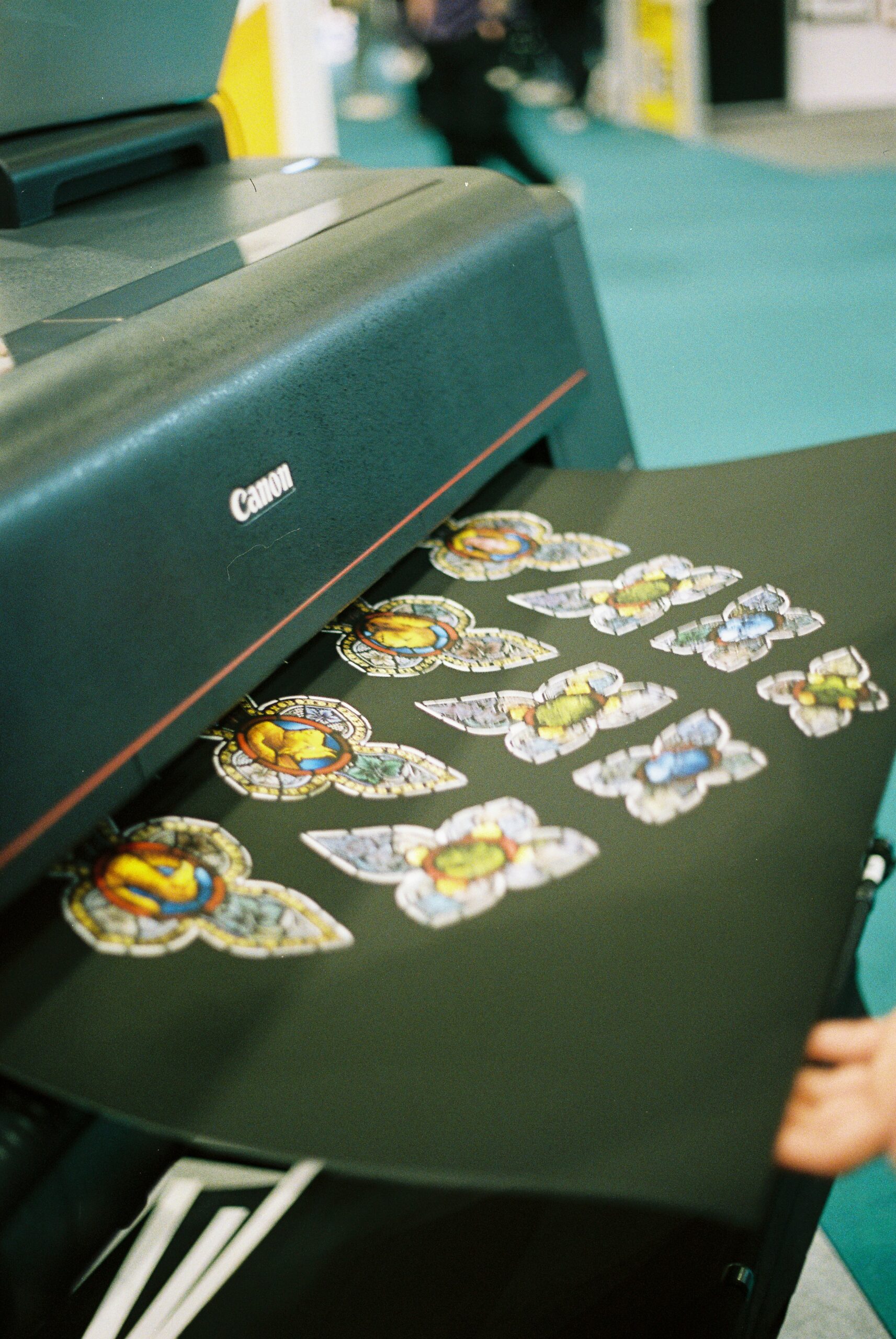 A Canon printer showing DTG vs DTF printing.